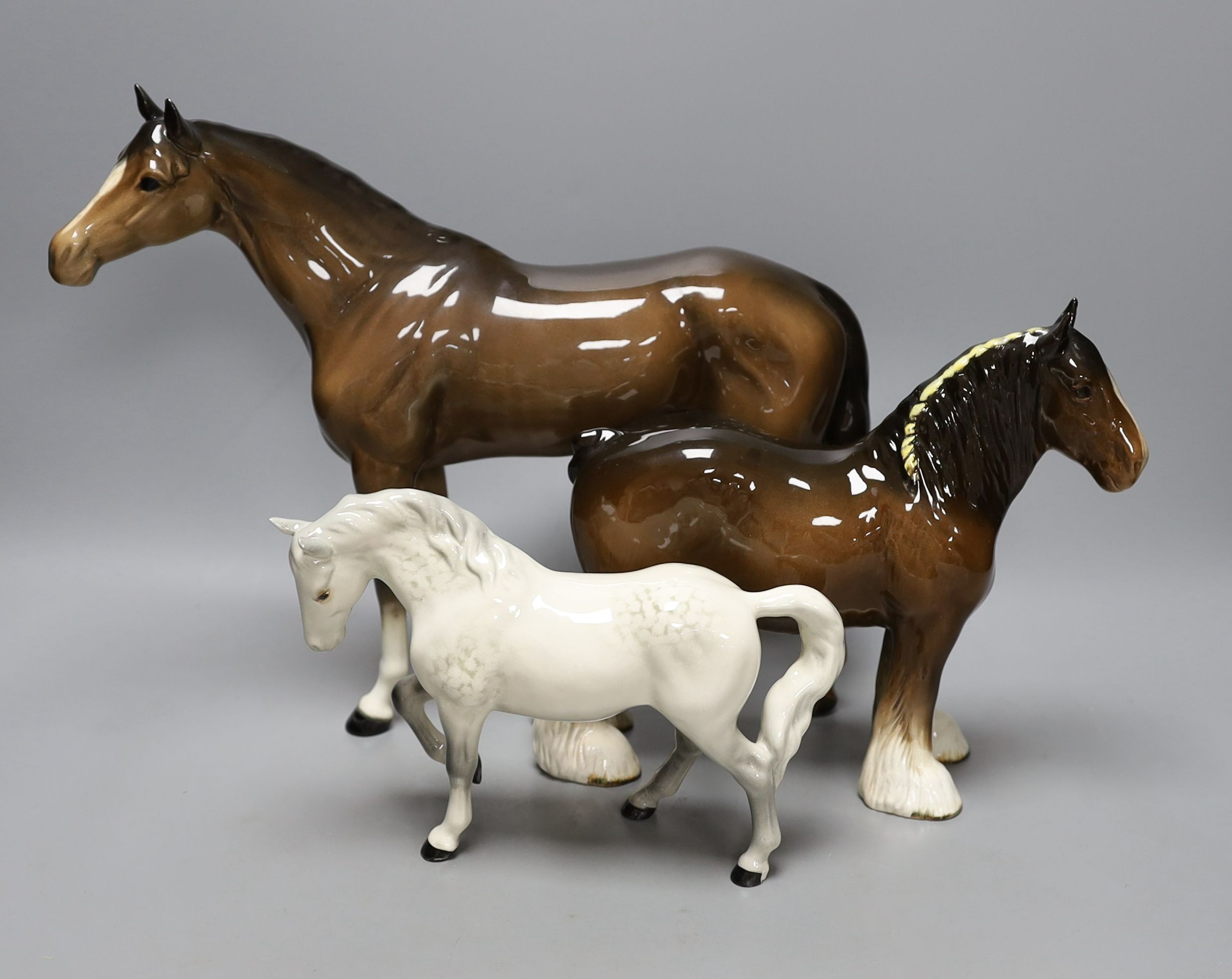 3 Beswick horses, including a Suffolk Punch. Tallest 29cm
